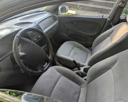 Белый Киа Рио, объемом двигателя 1.3 л и пробегом 354 тыс. км за 703 $, фото 2 на Automoto.ua