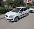 Белый Киа Рио, объемом двигателя 1.4 л и пробегом 165 тыс. км за 4200 $, фото 1 на Automoto.ua