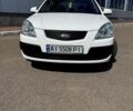 Белый Киа Рио, объемом двигателя 1.4 л и пробегом 223 тыс. км за 5200 $, фото 1 на Automoto.ua