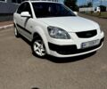 Белый Киа Рио, объемом двигателя 1.4 л и пробегом 223 тыс. км за 5200 $, фото 4 на Automoto.ua