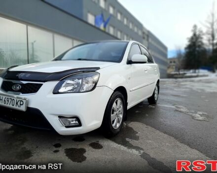 Білий Кіа Ріо, об'ємом двигуна 1.4 л та пробігом 91 тис. км за 5900 $, фото 6 на Automoto.ua