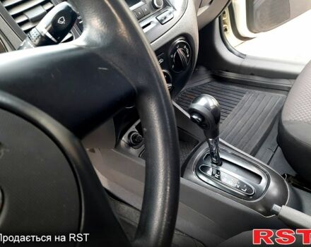 Білий Кіа Ріо, об'ємом двигуна 1.4 л та пробігом 91 тис. км за 5900 $, фото 2 на Automoto.ua