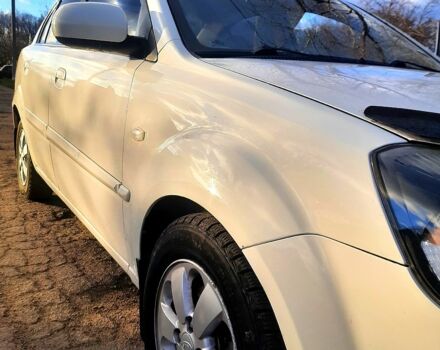 Белый Киа Рио, объемом двигателя 1.4 л и пробегом 91 тыс. км за 6000 $, фото 4 на Automoto.ua