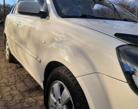 Белый Киа Рио, объемом двигателя 1.4 л и пробегом 91 тыс. км за 6000 $, фото 23 на Automoto.ua