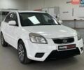 Белый Киа Рио, объемом двигателя 1.49 л и пробегом 170 тыс. км за 4990 $, фото 1 на Automoto.ua