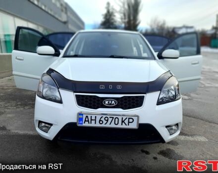 Білий Кіа Ріо, об'ємом двигуна 1.4 л та пробігом 91 тис. км за 5900 $, фото 8 на Automoto.ua
