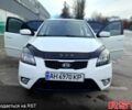 Білий Кіа Ріо, об'ємом двигуна 1.4 л та пробігом 91 тис. км за 5900 $, фото 8 на Automoto.ua