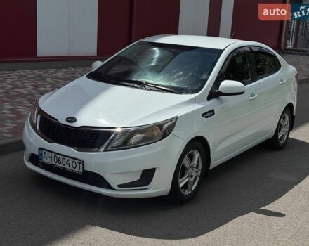 Білий Кіа Ріо, об'ємом двигуна 1.4 л та пробігом 219 тис. км за 5999 $, фото 2 на Automoto.ua