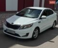 Білий Кіа Ріо, об'ємом двигуна 1.4 л та пробігом 219 тис. км за 5999 $, фото 2 на Automoto.ua