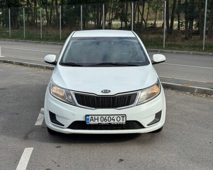 Білий Кіа Ріо, об'ємом двигуна 1.4 л та пробігом 218 тис. км за 5750 $, фото 1 на Automoto.ua