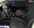 Білий Кіа Ріо, об'ємом двигуна 1.4 л та пробігом 219 тис. км за 5999 $, фото 6 на Automoto.ua