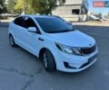Білий Кіа Ріо, об'ємом двигуна 1.4 л та пробігом 162 тис. км за 6999 $, фото 4 на Automoto.ua