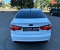 Білий Кіа Ріо, об'ємом двигуна 1.4 л та пробігом 162 тис. км за 6999 $, фото 10 на Automoto.ua