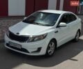Білий Кіа Ріо, об'ємом двигуна 1.4 л та пробігом 219 тис. км за 6400 $, фото 2 на Automoto.ua