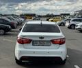 Білий Кіа Ріо, об'ємом двигуна 1.4 л та пробігом 218 тис. км за 5750 $, фото 4 на Automoto.ua