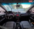 Білий Кіа Ріо, об'ємом двигуна 1.4 л та пробігом 167 тис. км за 6900 $, фото 12 на Automoto.ua