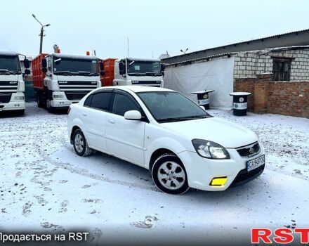 Білий Кіа Ріо, об'ємом двигуна 1.4 л та пробігом 22500 тис. км за 6200 $, фото 4 на Automoto.ua