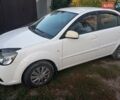 Білий Кіа Ріо, об'ємом двигуна 1.4 л та пробігом 191 тис. км за 4800 $, фото 1 на Automoto.ua
