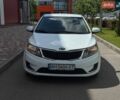 Білий Кіа Ріо, об'ємом двигуна 1.4 л та пробігом 219 тис. км за 5999 $, фото 1 на Automoto.ua