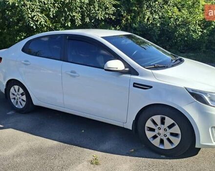 Белый Киа Рио, объемом двигателя 1.59 л и пробегом 210 тыс. км за 6800 $, фото 2 на Automoto.ua