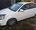 Белый Киа Рио, объемом двигателя 1.4 л и пробегом 191 тыс. км за 4600 $, фото 1 на Automoto.ua