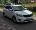 Білий Кіа Ріо, об'ємом двигуна 1.4 л та пробігом 219 тис. км за 5999 $, фото 1 на Automoto.ua