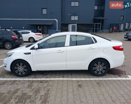 Білий Кіа Ріо, об'ємом двигуна 1.4 л та пробігом 230 тис. км за 5300 $, фото 2 на Automoto.ua