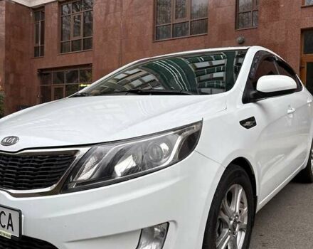 Білий Кіа Ріо, об'ємом двигуна 1.6 л та пробігом 91 тис. км за 8600 $, фото 13 на Automoto.ua