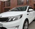 Білий Кіа Ріо, об'ємом двигуна 1.6 л та пробігом 91 тис. км за 8600 $, фото 13 на Automoto.ua