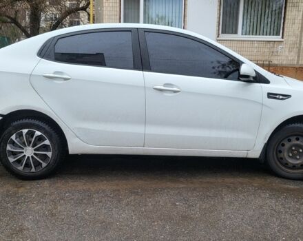 Білий Кіа Ріо, об'ємом двигуна 1.4 л та пробігом 220 тис. км за 6100 $, фото 1 на Automoto.ua