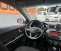 Білий Кіа Ріо, об'ємом двигуна 1.6 л та пробігом 123 тис. км за 8508 $, фото 16 на Automoto.ua