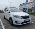 Білий Кіа Ріо, об'ємом двигуна 1.4 л та пробігом 230 тис. км за 5300 $, фото 11 на Automoto.ua