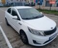 Білий Кіа Ріо, об'ємом двигуна 1.4 л та пробігом 230 тис. км за 5300 $, фото 5 на Automoto.ua