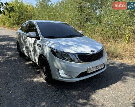 Білий Кіа Ріо, об'ємом двигуна 1.4 л та пробігом 96 тис. км за 8555 $, фото 2 на Automoto.ua