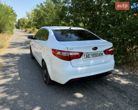 Білий Кіа Ріо, об'ємом двигуна 1.4 л та пробігом 96 тис. км за 8555 $, фото 5 на Automoto.ua