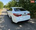 Білий Кіа Ріо, об'ємом двигуна 1.4 л та пробігом 96 тис. км за 8555 $, фото 5 на Automoto.ua