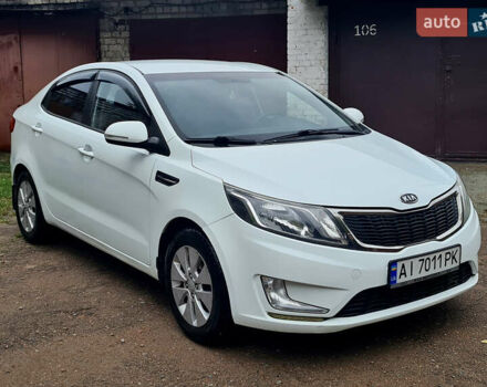 Белый Киа Рио, объемом двигателя 1.59 л и пробегом 159 тыс. км за 8800 $, фото 1 на Automoto.ua