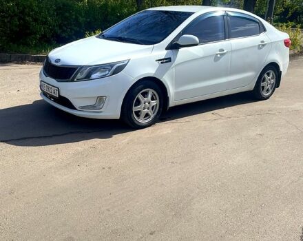 Білий Кіа Ріо, об'ємом двигуна 1.4 л та пробігом 249 тис. км за 6000 $, фото 2 на Automoto.ua