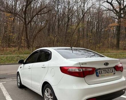 Білий Кіа Ріо, об'ємом двигуна 1.6 л та пробігом 91 тис. км за 8600 $, фото 14 на Automoto.ua