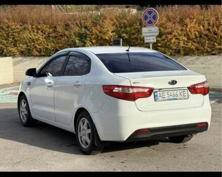 Белый Киа Рио, объемом двигателя 1.4 л и пробегом 210 тыс. км за 7500 $, фото 1 на Automoto.ua