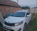 Білий Кіа Ріо, об'ємом двигуна 1.4 л та пробігом 266 тис. км за 6900 $, фото 1 на Automoto.ua