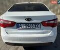 Білий Кіа Ріо, об'ємом двигуна 1.6 л та пробігом 235 тис. км за 7600 $, фото 3 на Automoto.ua