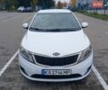 Білий Кіа Ріо, об'ємом двигуна 1.4 л та пробігом 230 тис. км за 5300 $, фото 1 на Automoto.ua
