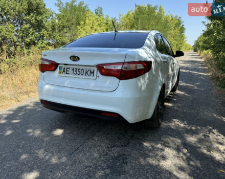 Білий Кіа Ріо, об'ємом двигуна 1.4 л та пробігом 96 тис. км за 8555 $, фото 6 на Automoto.ua