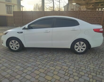 Білий Кіа Ріо, об'ємом двигуна 1.4 л та пробігом 158 тис. км за 6500 $, фото 11 на Automoto.ua