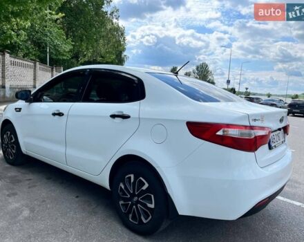 Белый Киа Рио, объемом двигателя 1.4 л и пробегом 220 тыс. км за 6900 $, фото 2 на Automoto.ua