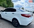 Белый Киа Рио, объемом двигателя 1.4 л и пробегом 220 тыс. км за 6900 $, фото 2 на Automoto.ua