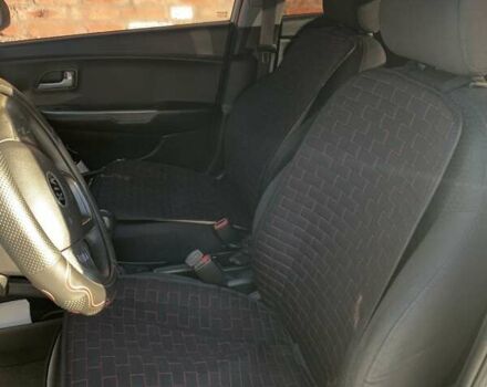 Білий Кіа Ріо, об'ємом двигуна 1.4 л та пробігом 266 тис. км за 6900 $, фото 11 на Automoto.ua