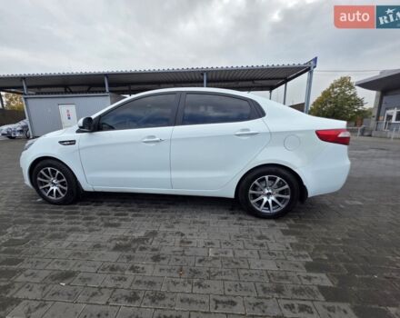 Білий Кіа Ріо, об'ємом двигуна 1.4 л та пробігом 288 тис. км за 6500 $, фото 14 на Automoto.ua