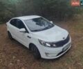 Белый Киа Рио, объемом двигателя 1.4 л и пробегом 253 тыс. км за 7050 $, фото 1 на Automoto.ua